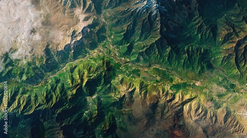 Top down Satellite view Aerial panorama of Earth captured by satellite featuring mountain ranges desert expanses and lush green forests