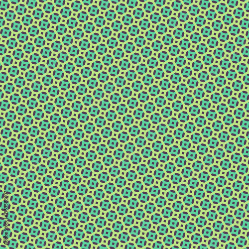 Repeated geometric pattern of green and yellow shapes forming a seamless tile design for backgrounds