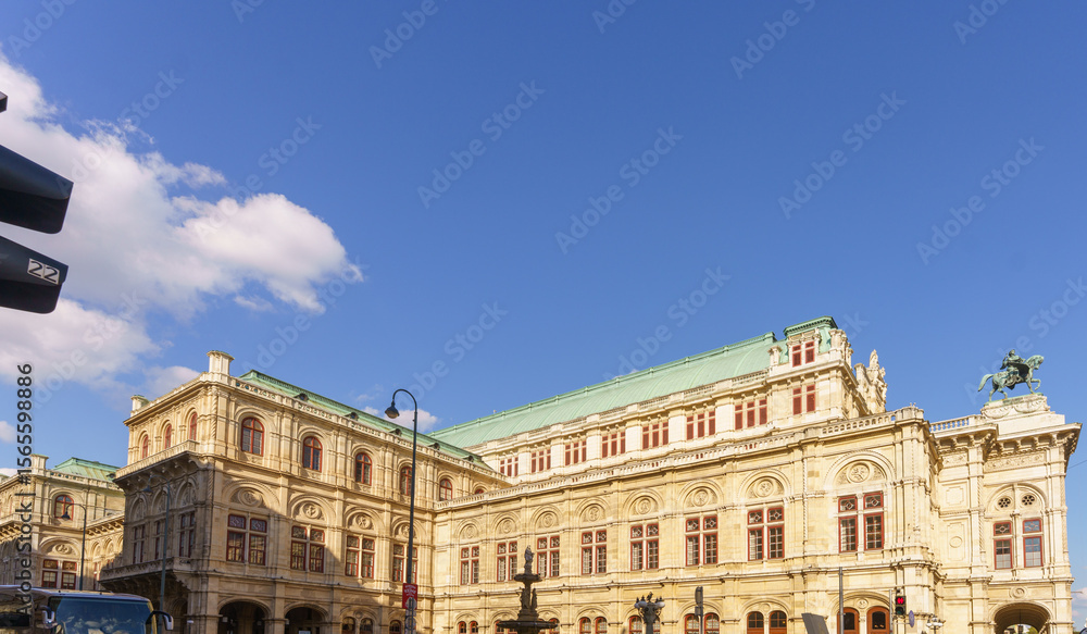 Fototapeta premium Vienna State Opera historic building under clear blue sky