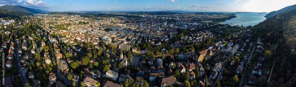 Aerial panorama view around the city Biel / Bienne in Switzerland on a sunny morning day in summer.
Aerial panorama view around the city Biel / Bienne in Switzerland on a sunny morning day in summer.