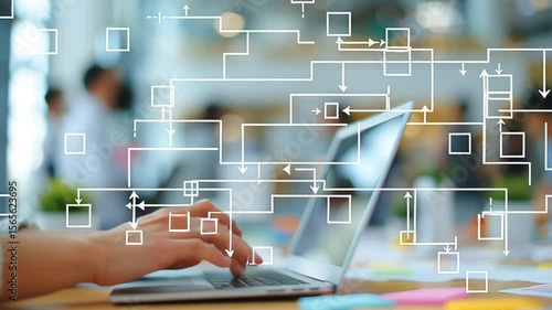 Person working on laptop with abstract flowchart overlay representing data analysis and process automation in a modern office. Concept of workflow management and digital innovation
