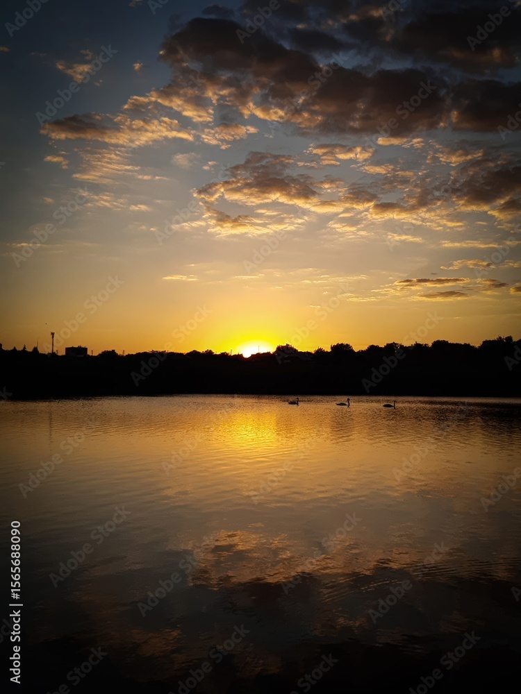 Obraz premium sunset over the river