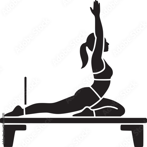 Silhouette of woman doing pilates on reformer with arm raised in a studio setting in black and white