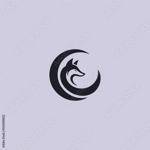 Jackal and moon logo in clean and mystical silhouette design.