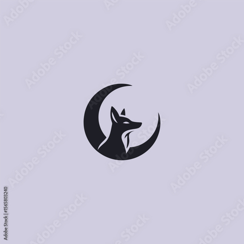 Jackal and moon logo in clean and mystical silhouette design.