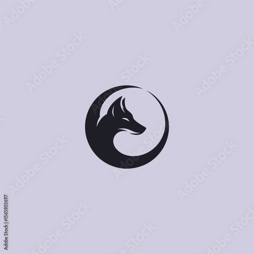 Jackal and moon logo in clean and mystical silhouette design.