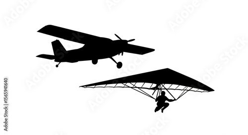Silhouette of an airplane and a hang glider against a white background.