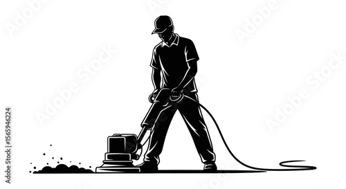 A construction worker uses a jackhammer to break up pavement, dust and debris flying.