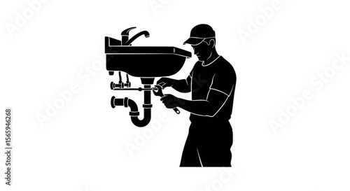 Silhouette of a plumber fixing pipes under a bathroom sink, using a wrench.