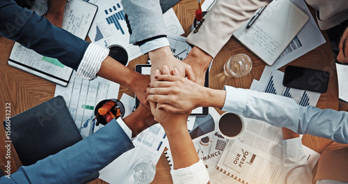 Foto Hands, stack and above at meeting with documents, finance, support and team work at office