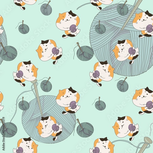 Seamless pattern of kitten cartoon with yarn balls illustration on aesthetic soft mint green background. Can print it on fabric, stationery, gift paper, wall art cover, bed cover, etc. 
