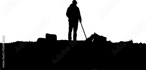 silhouette of a man with stick 