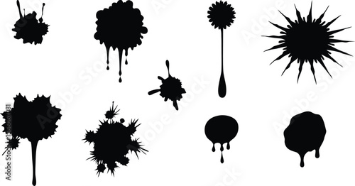 Set of black ink blot tree silhouettes with leaf and branch design elements