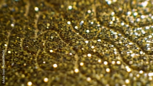 Gold glitter texture close-up