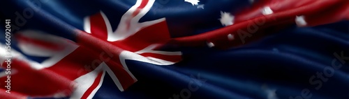 Australian flag waving in the breeze on a vibrant background.