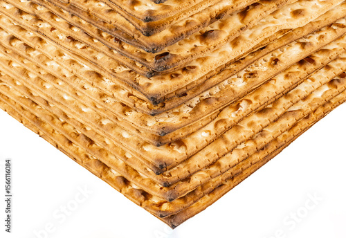 Close-Up View of Stacked Traditional Jewish Matzah Bread - Layered Texture of Unleavened Passover Crackers