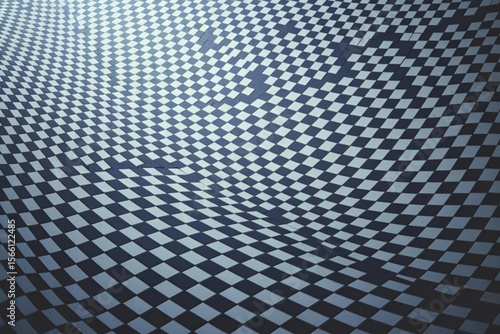 A photo of a white background with a repeating pattern of square tiles