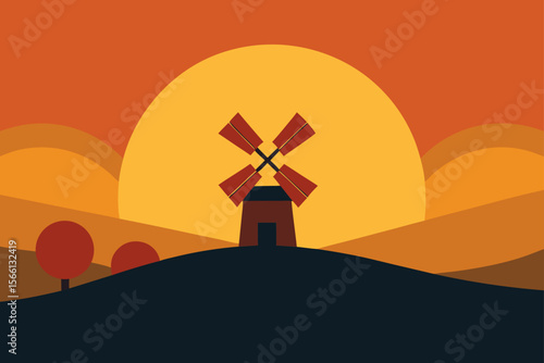 sunset behind windmill in countryside