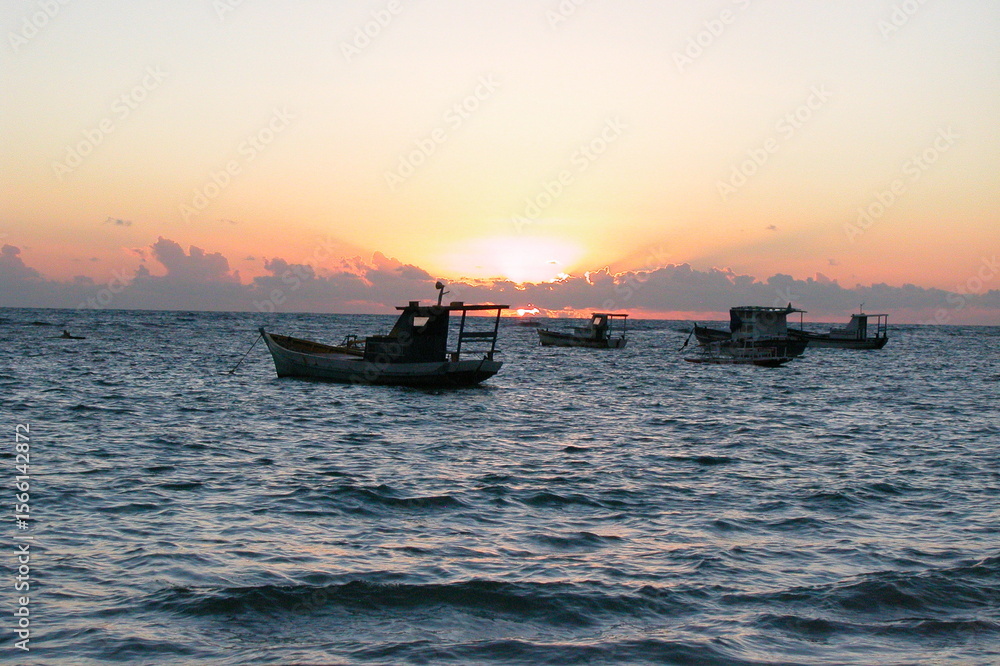 Fototapeta premium Boats on the water at sunset