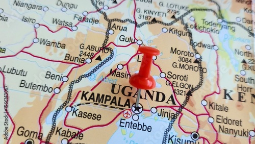 View of Kampala, Capital and the largest city of Uganda, on a geographical map of Africa, marked with red push pin