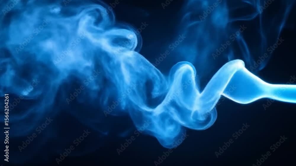 Abstract Blue Smoke Flowing Smoothly on a Dark Background for Creative Visual Effects Abstract Blue Smoke Flowing Smoothly on a Dark Background for Creative Visual Effects