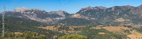 Panoramic view of the beautiful white village of Grazalema in a sunny day. Cadiz, Andalucia, Spain.