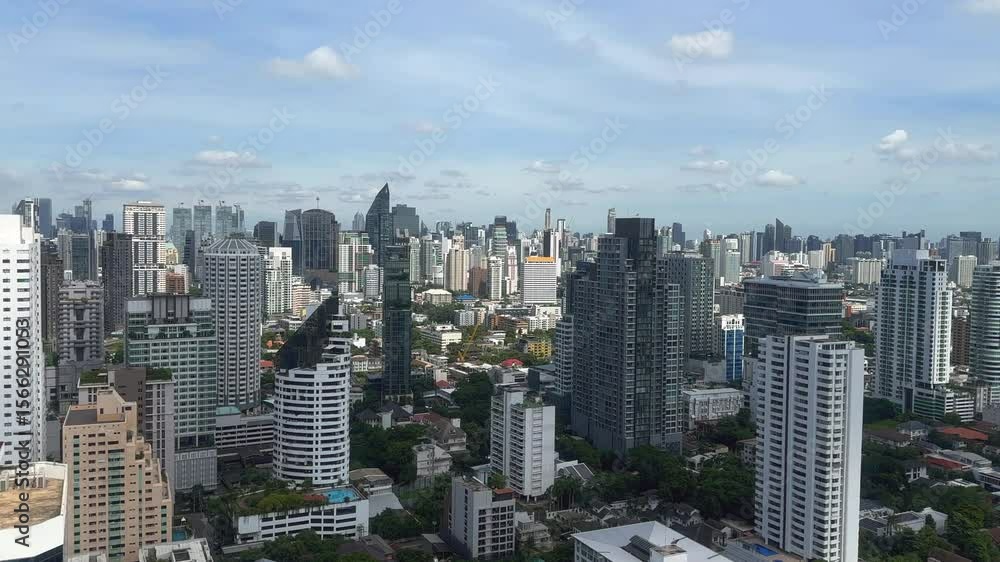 Aerial view of city skyscrapers. Cinematic drone shot of city skyline. Urban metropolis, high-rise modern architecture buildings. Big city buildings. Bangkok, Thailand. Aerial view of city skyscrapers. Cinematic drone shot of city skyline. Urban metropolis, high-rise modern architecture buildings. Big city buildings. Bangkok, Thailand.