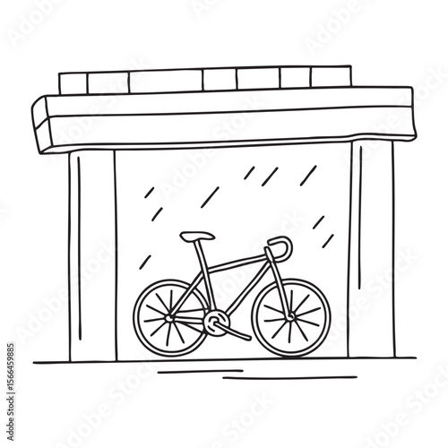 A bicycle secured to a pole under an urban overpass