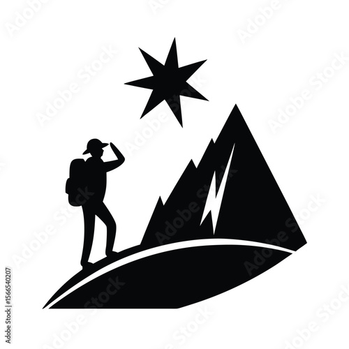 Black silhouette of hiker watching star over mountains