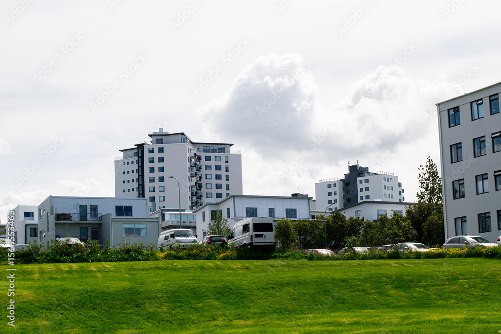Modern residential buildings and green lawn in Reykjavik, Iceland Modern residential buildings and green lawn in Reykjavik, Iceland