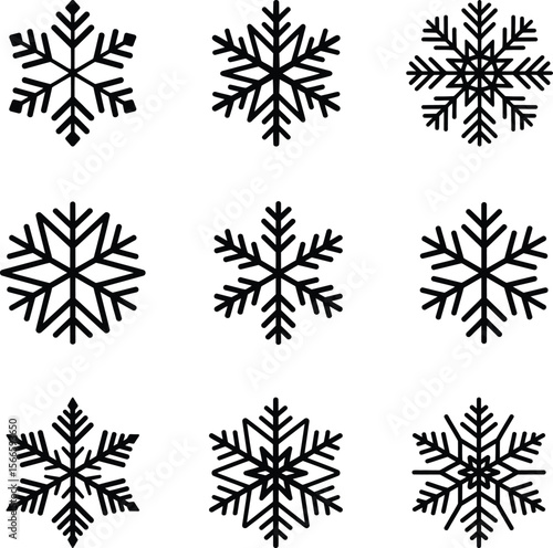 Wallpaper Mural Collection of Nine Unique Snowflake Designs in Black Silhouette Torontodigital.ca