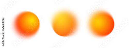 A collection of blurred orange and yellow gradient circles with noise and grainy textures