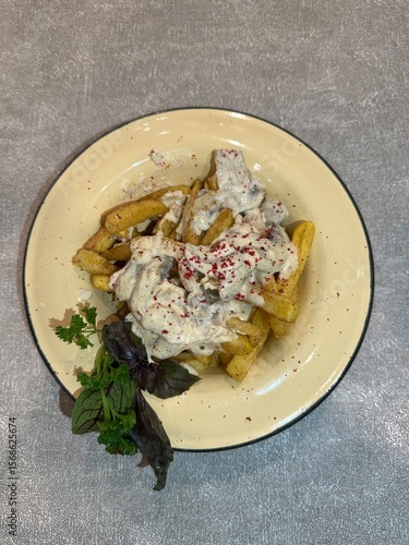 French fries with mushroom sauce