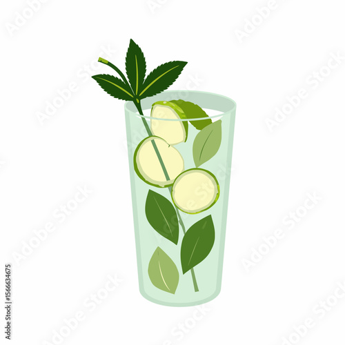 Refreshing mint and lime drink in clear glass with greenery  