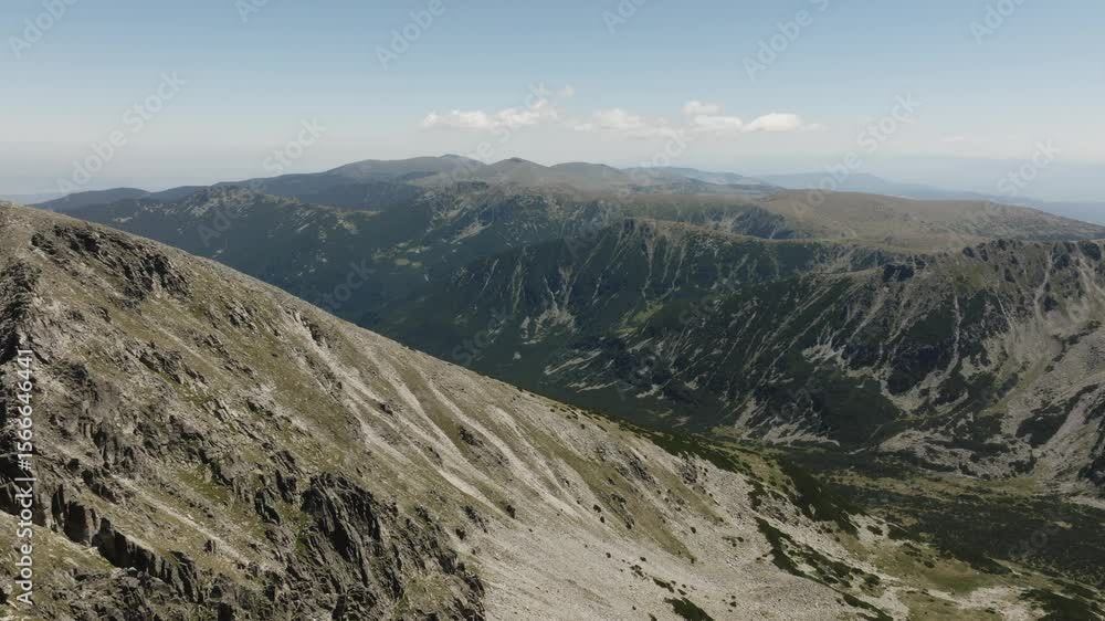 Aerial view of breathtaking mountain landscape.
Aerial view of breathtaking mountain landscape.