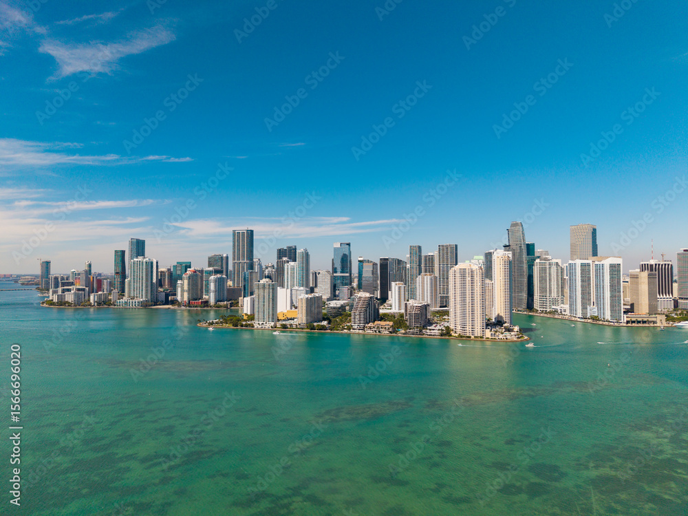 Fototapeta premium Miami downtown. Skyscraper building. Cityscape building downtown. City architecture. Miami downtown skyline. Miami skyscraper cityscape. Miami city skyline view of Brickell key. Travel to Florida