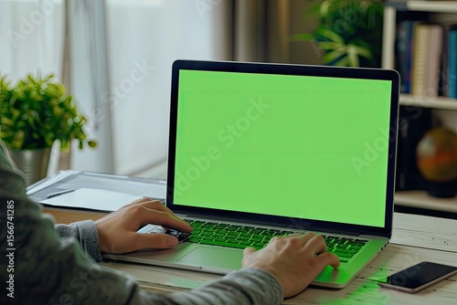 High Definition Visual of Casual Woman Typing on Laptop with Green Screen