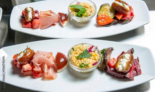 italian antipasti for catering on a white plate