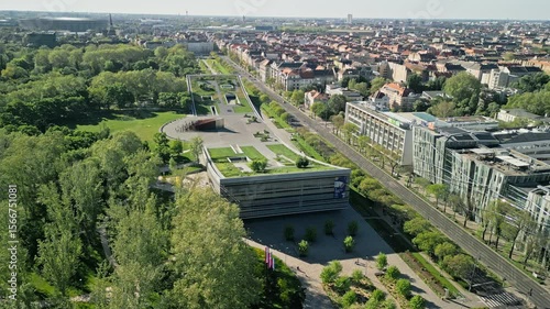Still drone video from an aerial viewpoint showing the Museum of Ethnography, City Park, and Puskás Aréna in Budapest during morning light with no camera movement.  