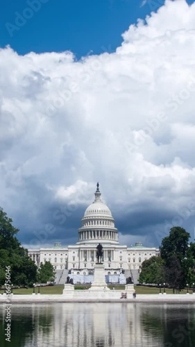 Ominous cumulus clouds gather over the U.S. Capitol Building in Washington, D.C., shown in a striking vertical time-lapse.