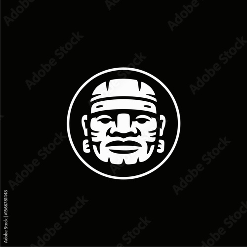 Illustration of a stylized Olmec head inside a circle, depicted in white against a black background.