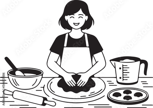 Happy woman wearing apron kneading dough with baking utensils and pastries