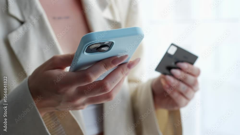 businesswoman with a mobile phone and a bank card makes online purchases.
Payment for goods online.
Using a bank card.
Transfer money online.
Pay for services using a bank card businesswoman with a mobile phone and a bank card makes online purchases.
Payment for goods online.
Using a bank card.
Transfer money online.
Pay for services using a bank card