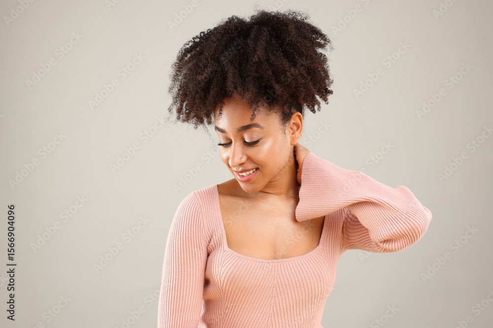 Portrait of beautiful Brazilian woman on gray background Portrait of beautiful Brazilian woman on gray background