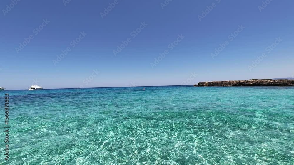 Aerial Drone of Blue Lagoon in Akamas Peninsula, Paphos, Cyprus Aerial Drone of Blue Lagoon in Akamas Peninsula, Paphos, Cyprus