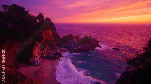 Sunset over coastal cliffs and ocean waterfall
