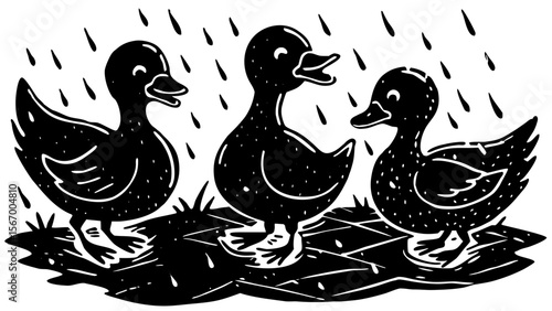 Three ducklings playing in the spring rain on a puddle