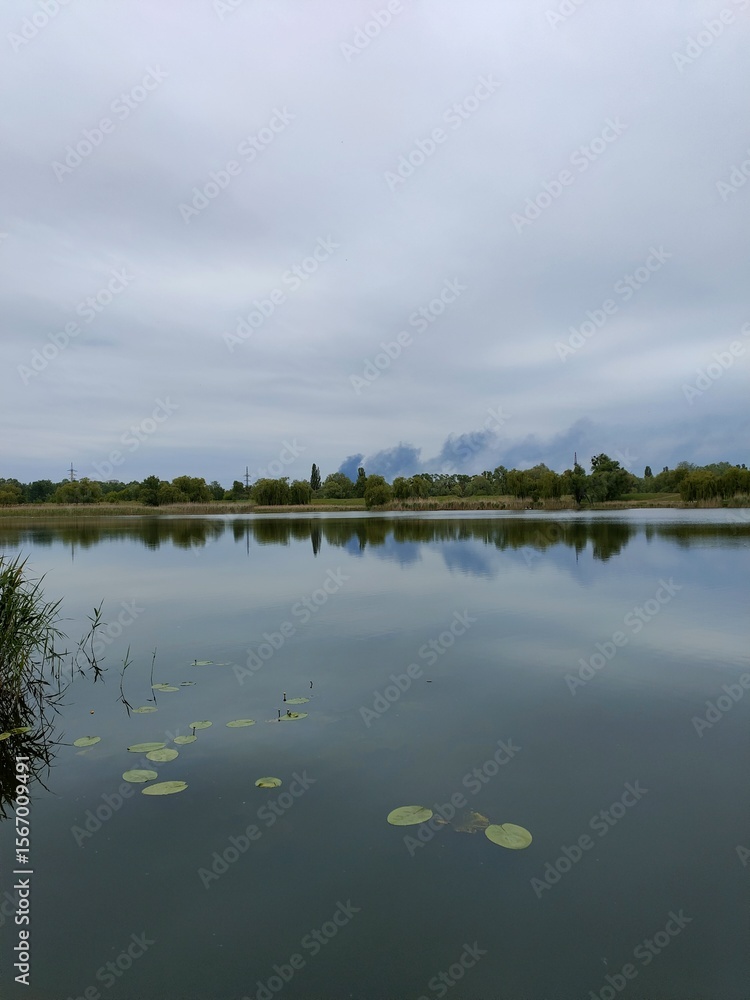Fototapeta premium clouds over the river