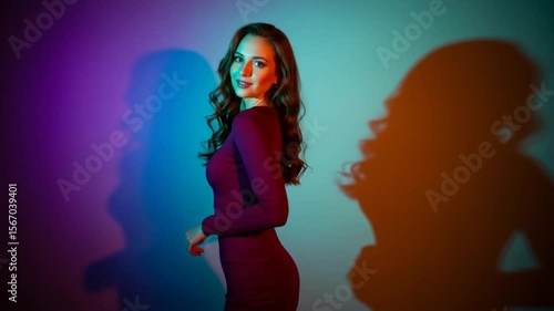 Vibrant Portrait of a Woman in a Purple Dress with Vivid Lighting