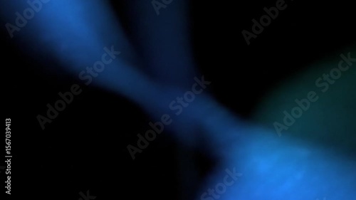 Abstract Blue and Green Light Streaks Moving on Black Background Seamless Loop